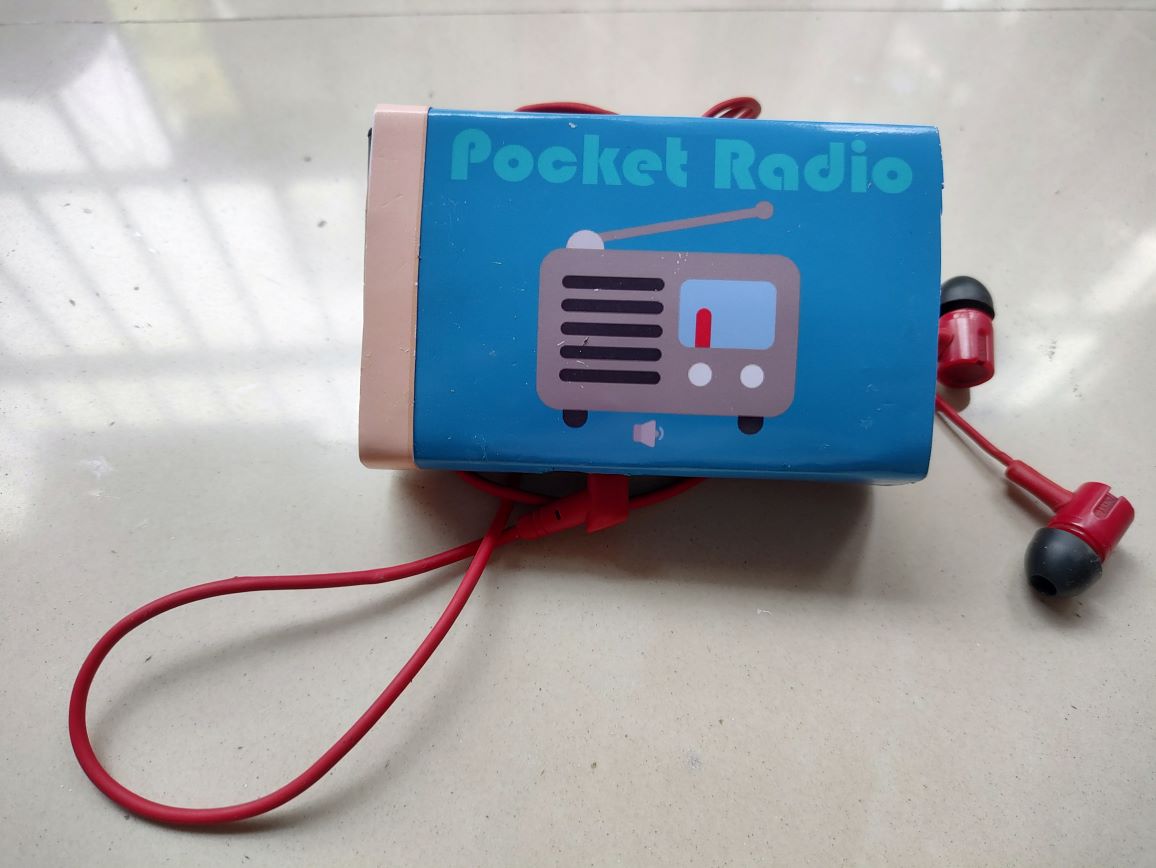 Radio inside the cardboard cover